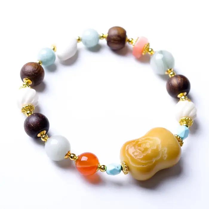 Bracelet en noix de tagua brûlée au charbon avec cœur en corne