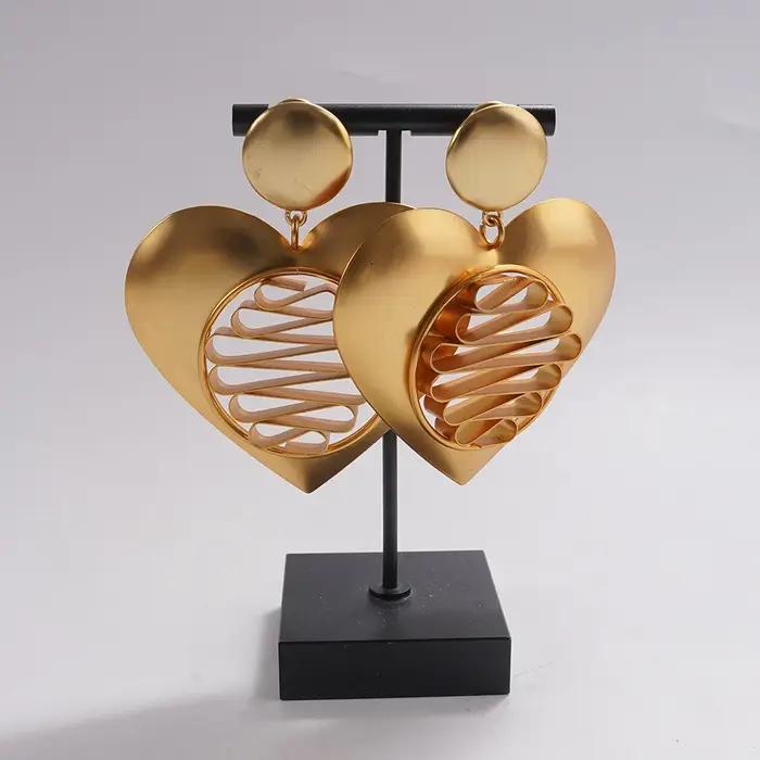 Boucles d'oreilles pendantes en forme de cœur pour femmes, ton or, torsadé moderne, creux, bijoux de