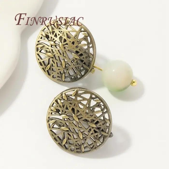 Fermoirs de boucles d'oreilles en bronze antique pour hommes et femmes