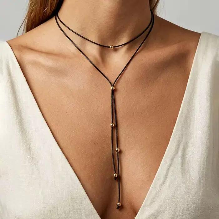 Collier pendentif nœud papillon en corde noire vintage pour femme, élégant, en métal perlé, long et
