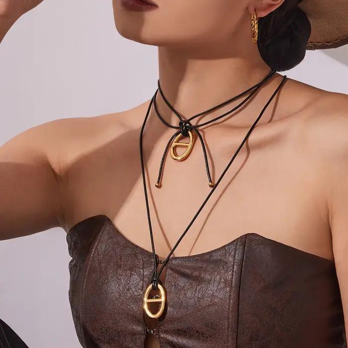 Ars – collier avec pendentif en forme de grain de café en acier inoxydable plaqué or 18 carats