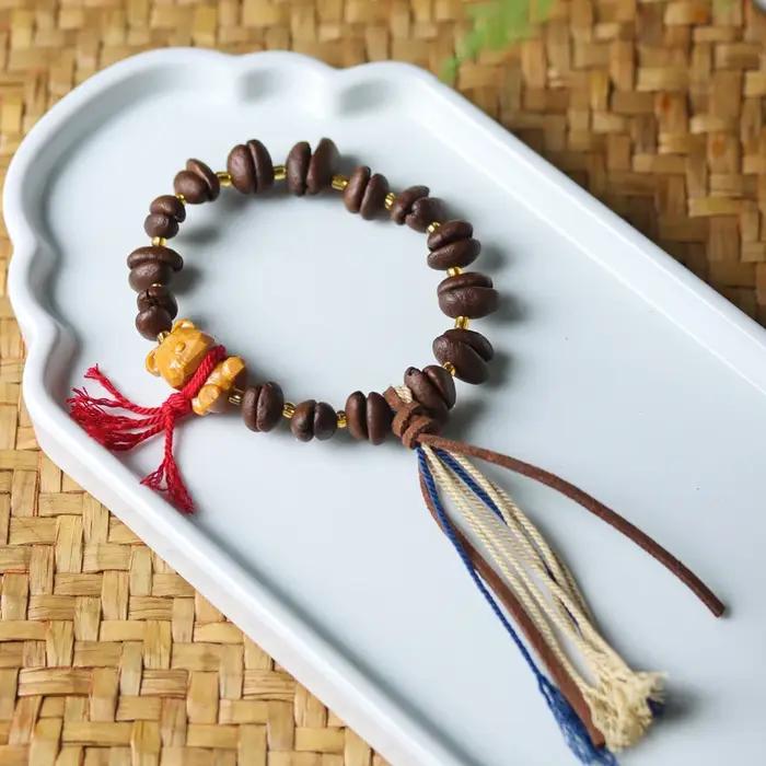 Bracelet mignon de grain de café pour des dames