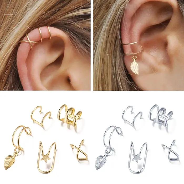 Boucles d'oreilles à clip en forme d'étoile géométrique pour femme en alliage de zinc avec finitions plaqué rhodium or rose et argent pour occasions spéciales