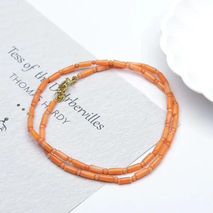 Collier de corail naturel de forme cylindrique 3x7mm