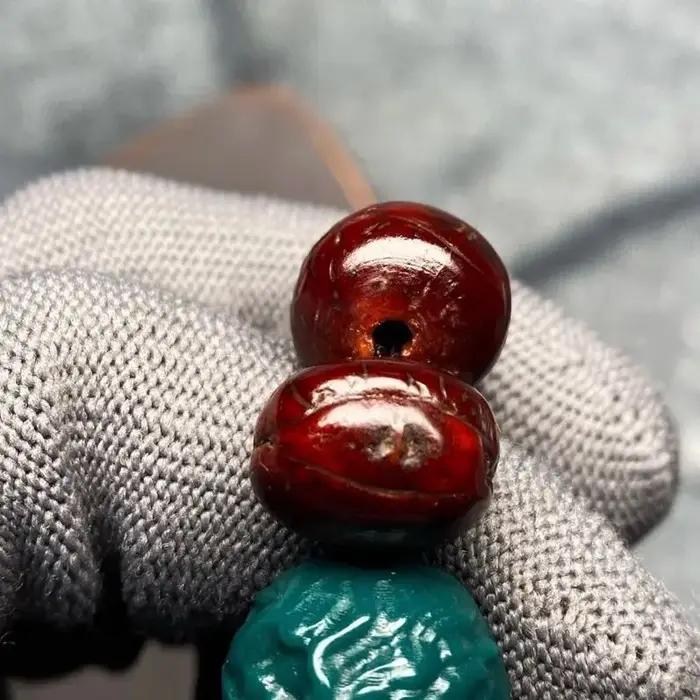 Bracelet tibétain en œil de phénix rouge de 14mm