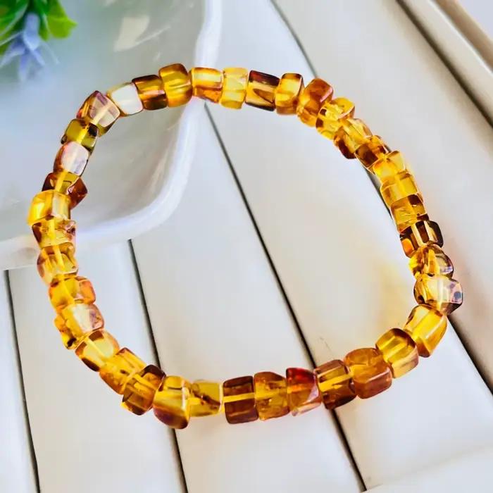 Bracelet en ambre naturel unisexe avec design vendange et bienfaits thérapeutiques pour femmes et hommes occasions spéciales