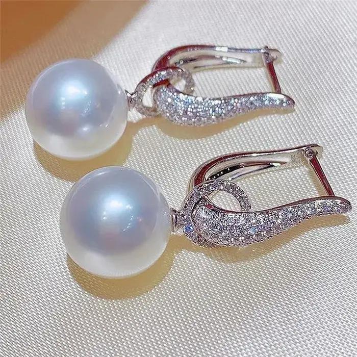 Boucles d'oreilles pendantes en zircone cubique scintillante élégantes et modernes pour femmes occasions spéciales
