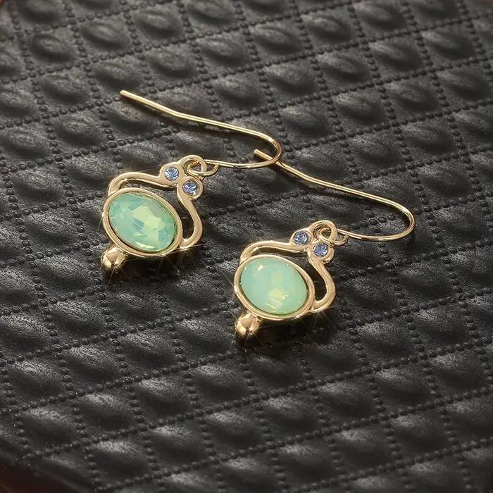 Boucles d'oreilles ovales classiques en or incrusté de pierres vertes pour femmes