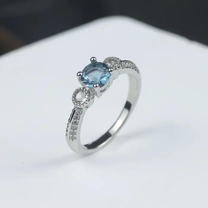 Bague de fiançailles en argent sterling avec topaze bleue pour femme