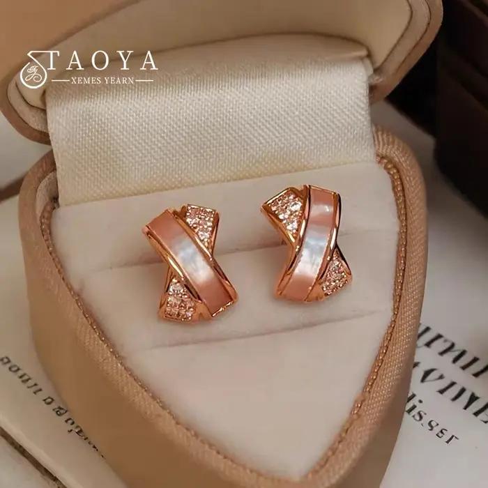 Boucles d'oreilles miniatures en métal couleur or rose avec zircon en forme de coquille entrecroisée pour femme – Bijou