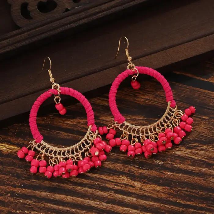 Boucles d'oreilles rondes à franges géométriques faites à la main