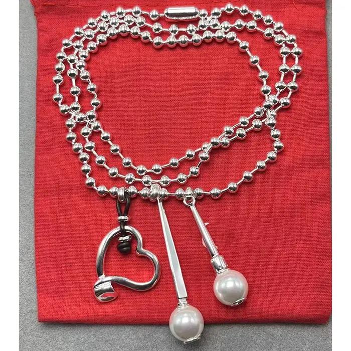 Ensemble de colliers espagnols faits à la main pour femmes avec variété de finitions métalliques occasions spéciales cadeau bijoux d'artisanat