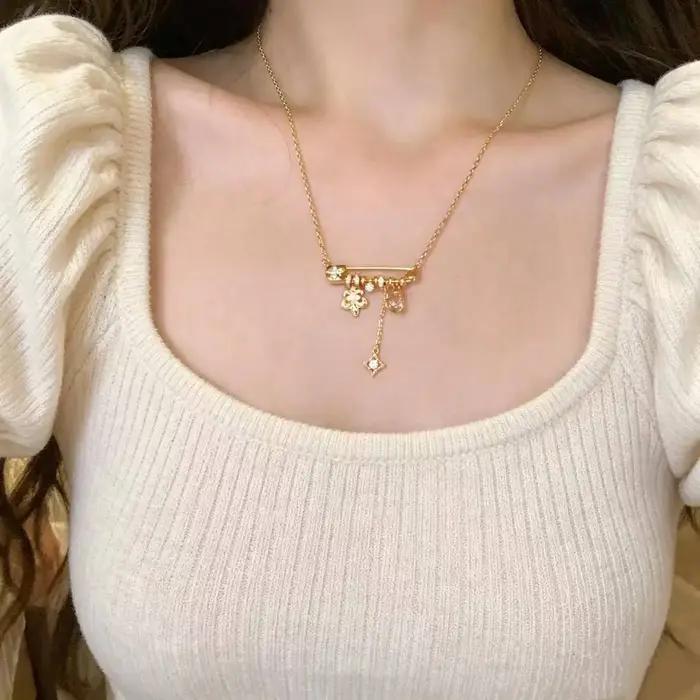 Collier pendentif broche étoile iris brossé avec perle pour femme