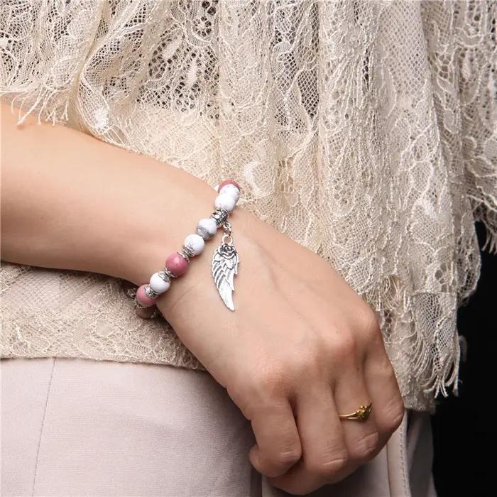Bracelet pendentif aile d'ange Rose couleur argent fait à la main