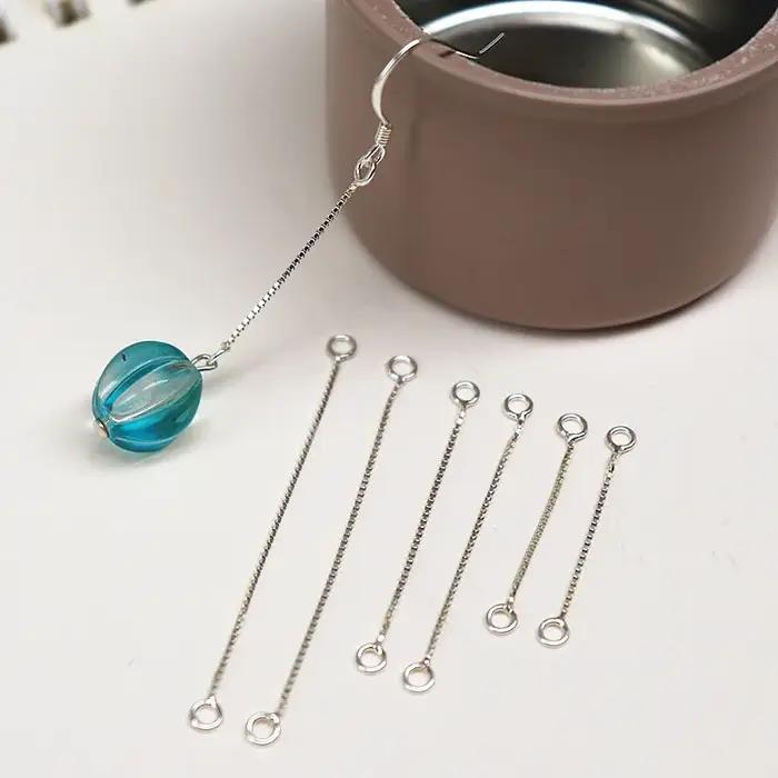 1 paire de boucles d'oreilles en argent Sterling 925