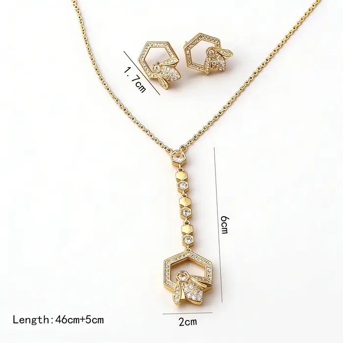 Ensemble collier et boucles d'oreilles en forme de Y plaqué or avec motif nid d'abeille pour femme