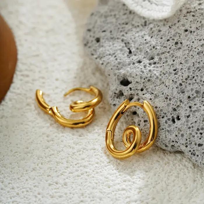 Boucles d'oreilles vortex exquises pour femmes