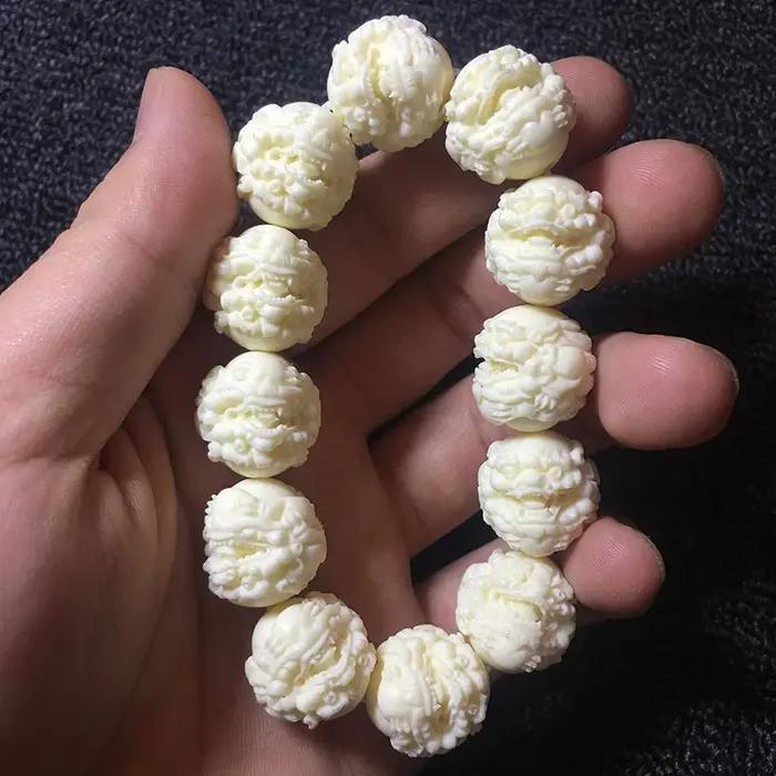 Bracelet de perles Pixiu sculptées en ivoire naturel
