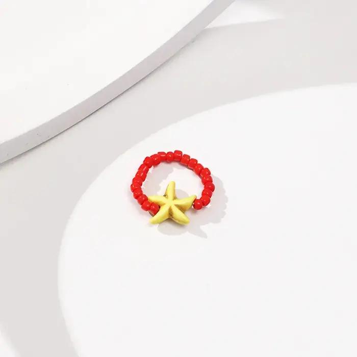 Bague étoile de mer colorée avec perles de rocaille tissées anneau élastique réglable pour filles et enfants bijoux amusants vacances d'été océan fantaisie