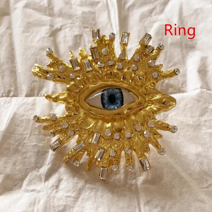 Boucles d'oreilles pendantes baroques en strass et alliage de cuivre pour femmes occasions spéciales à offrir elegance hyperbolique
