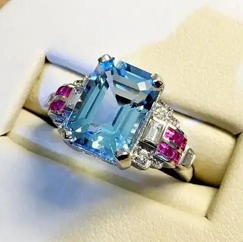 Nouvelle bague 2026 en topaze et aigue-marine - Sertie de spinels rouges - Un cadeau de la Saint-Val