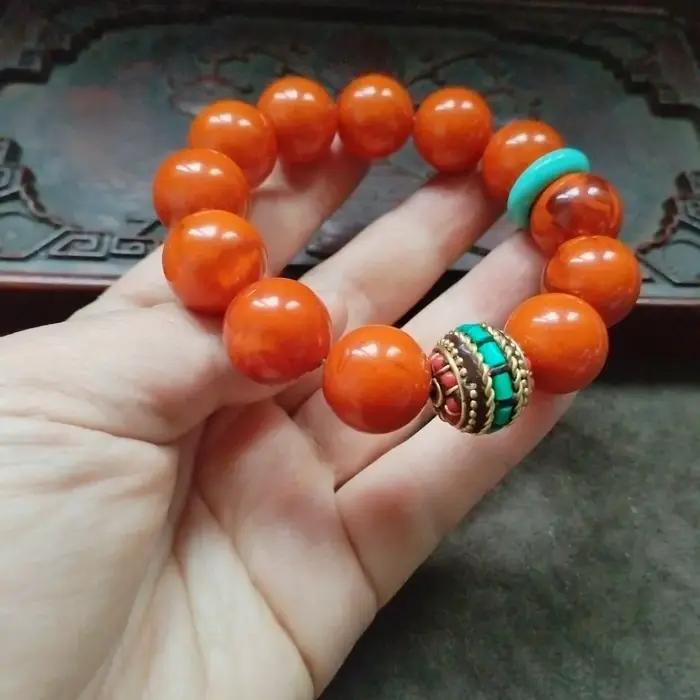 Bracelet de perles rondes orange avec intercalaire turquoise
