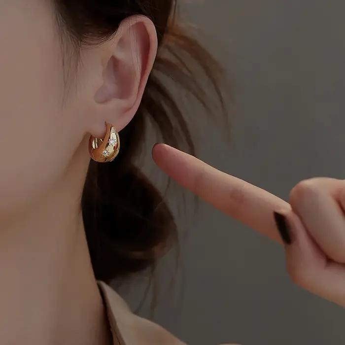 Boucles d'oreilles Mango Star en zircone en forme de larme