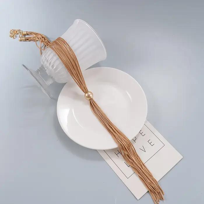 Collier Y en or multi-brins avec pampilles