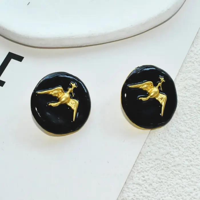 Boucles d'oreilles rondes élégantes aux motifs d'oiseaux dorés pour femmes mode et collection tendance