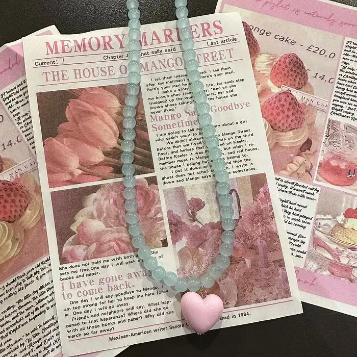 Collier avec pendentif en forme de cœur perlé coloré pour femmes et filles