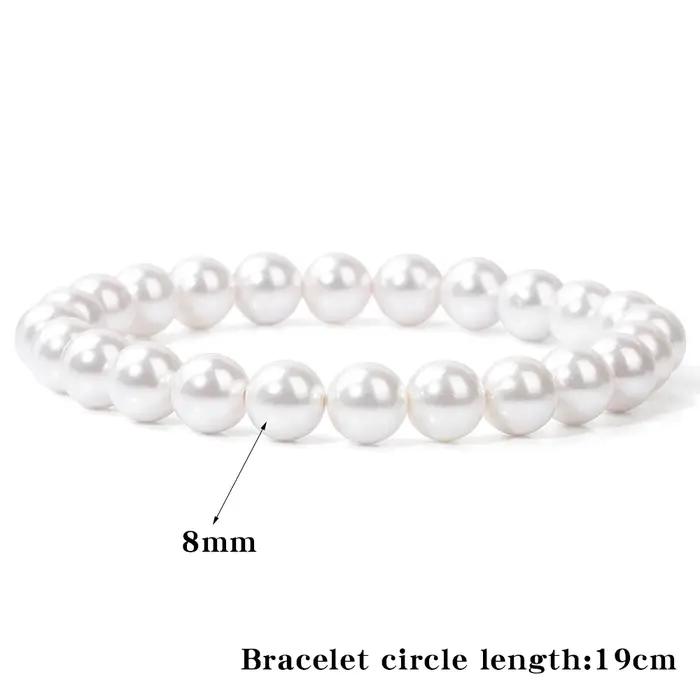 Bracelet élastique en perles de coquillage naturel blanc pour femme