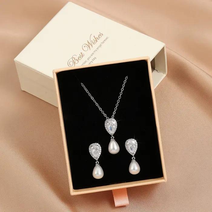 Ensemble de bijoux ZAKOL imitation perle zircone avec boucles d'oreilles et collier pour femmes occasions spéciales mariage et fête