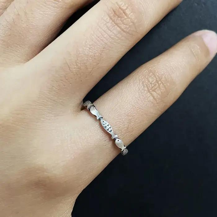 Bague de poisson de natation en argent pur 999