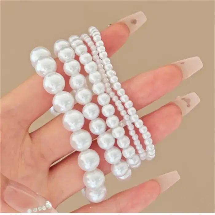 Bracelets en perles d'imitation classiques avec finition plaquée platine pour femmes, bracelets à brins rétro élégants pour occasions spéciales