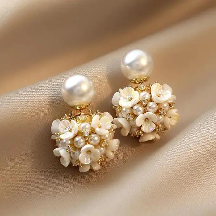 Boucles d'oreilles en perles de fleur de coquille blanche pour femmes
