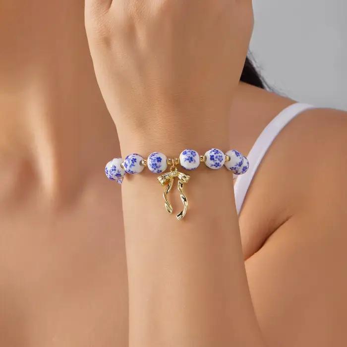 Bracelet tendance en céramique et métal pour femme, élégant, vintage, doux, pour fête, avec nœud papillon, imitation bijoux, cadeau