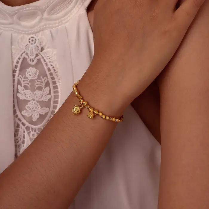 Bracelet à breloques en forme de cloche