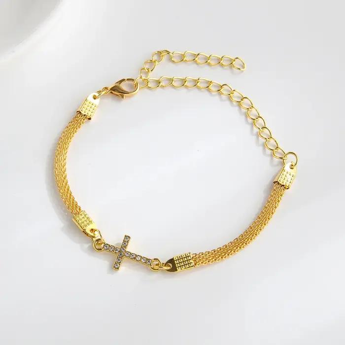 Bracelet en alliage avec strass en forme de croix