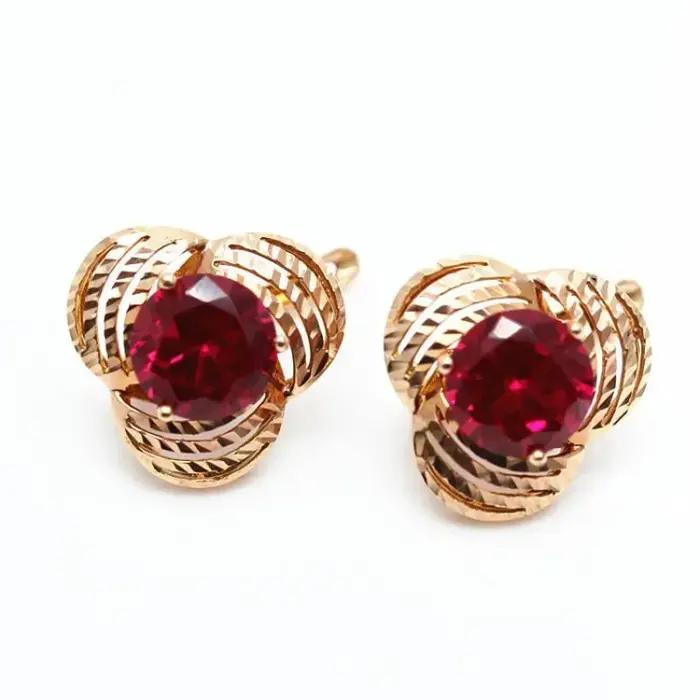 Boucles d'oreilles fleur incrustées d'or violet pour femme