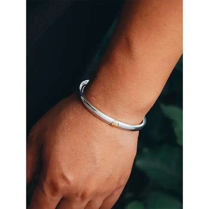 Bracelet vintage Goro's Aigle à quatre yeux en or pour couple