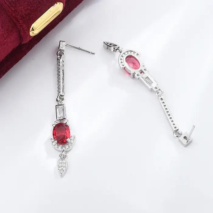 Boucles d'oreilles longues pompon diamant pour femme