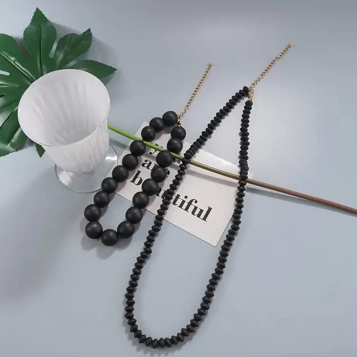 Collier superposé noir minimaliste moderne avec perles – Accessoire tendance pour les brunches et les tenues élégantes