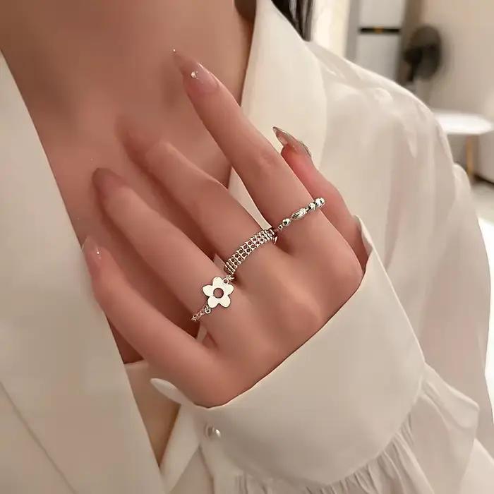PONYKISS – bague en forme de fleur couleur argent avec longue chaîne à pampilles