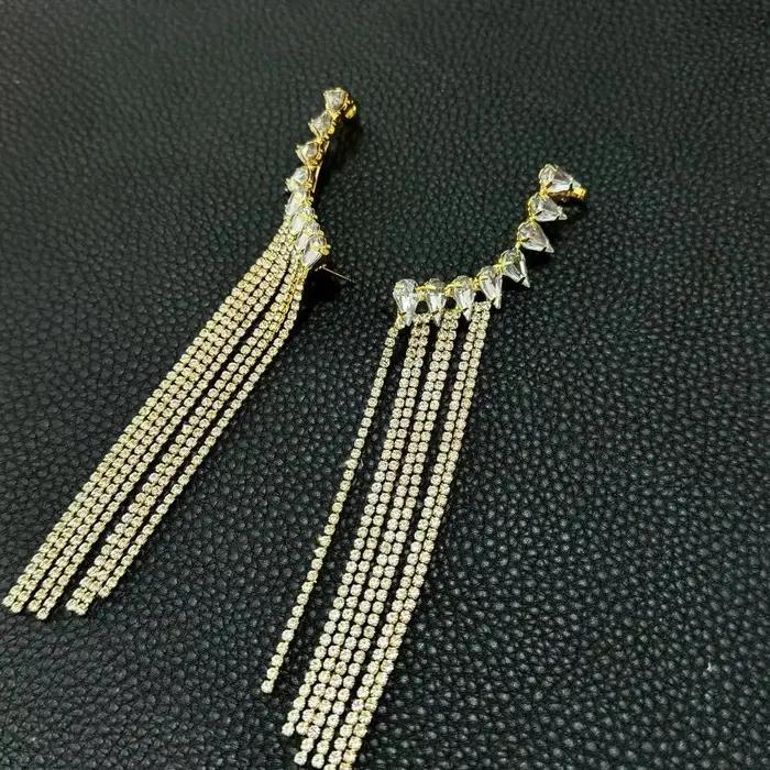 Boucles d'oreilles à pampilles longues exagérées avec diamants intégrés