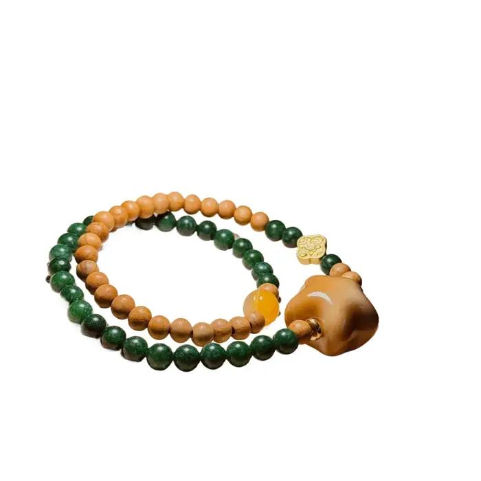 Bracelet double boucle en bois de pêcher style vintage avec perles de prière bouddhistes