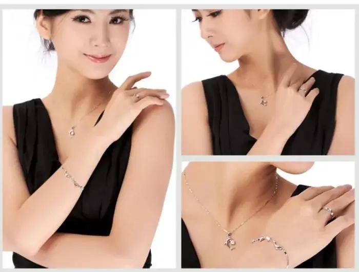 Ensemble de collier et boucles d'oreilles en forme de dauphin en argent Sterling S925