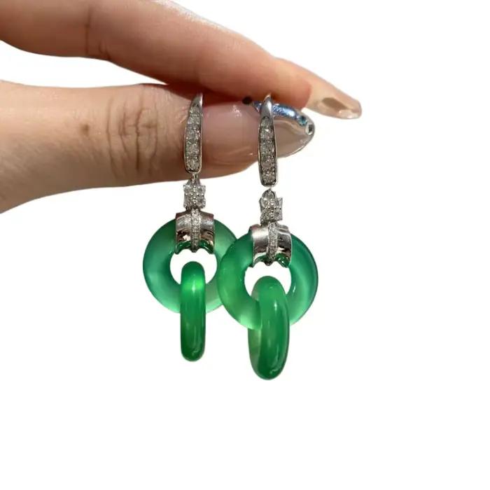 Boucles d'oreilles entrelacées fraîches en argent 925 incrusté de diamants