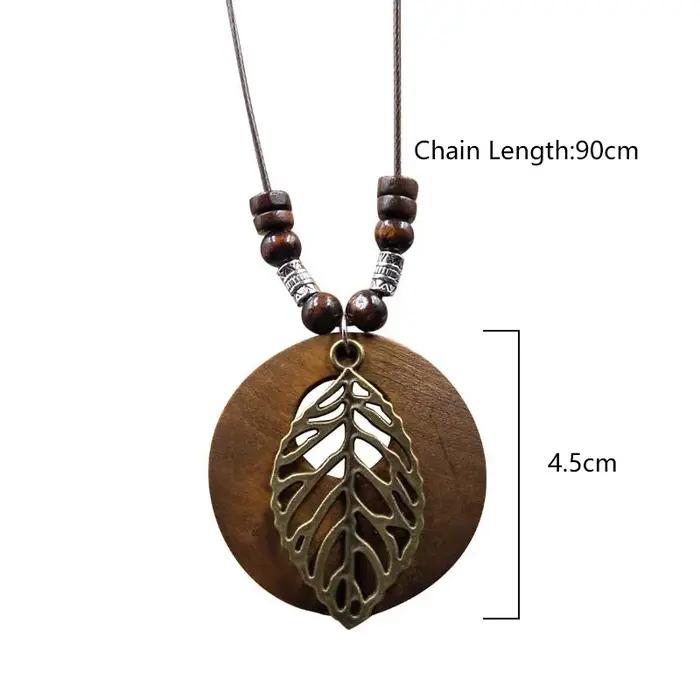 Collier en bois de style ethnique vintage avec pendentif perlé