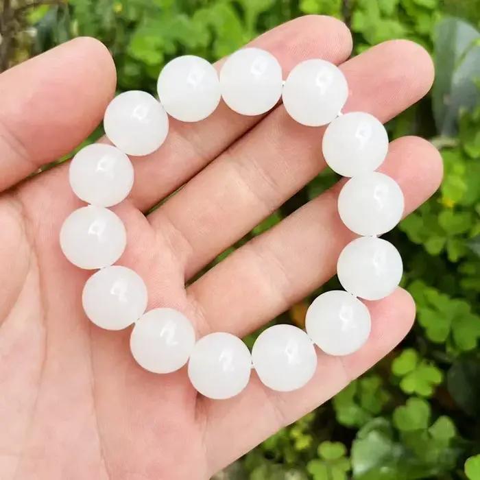 Bracelet en jade jaspe perles breloques animaux de compagnie mode soiree femme cadeau occasion speciale elegance subtile