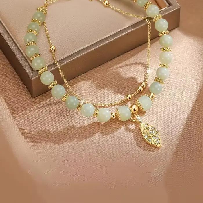 Bracelet en jade vert style chinois pour femmes avec motifs feuilles dorées cadeau pour occasions spéciales femmes
